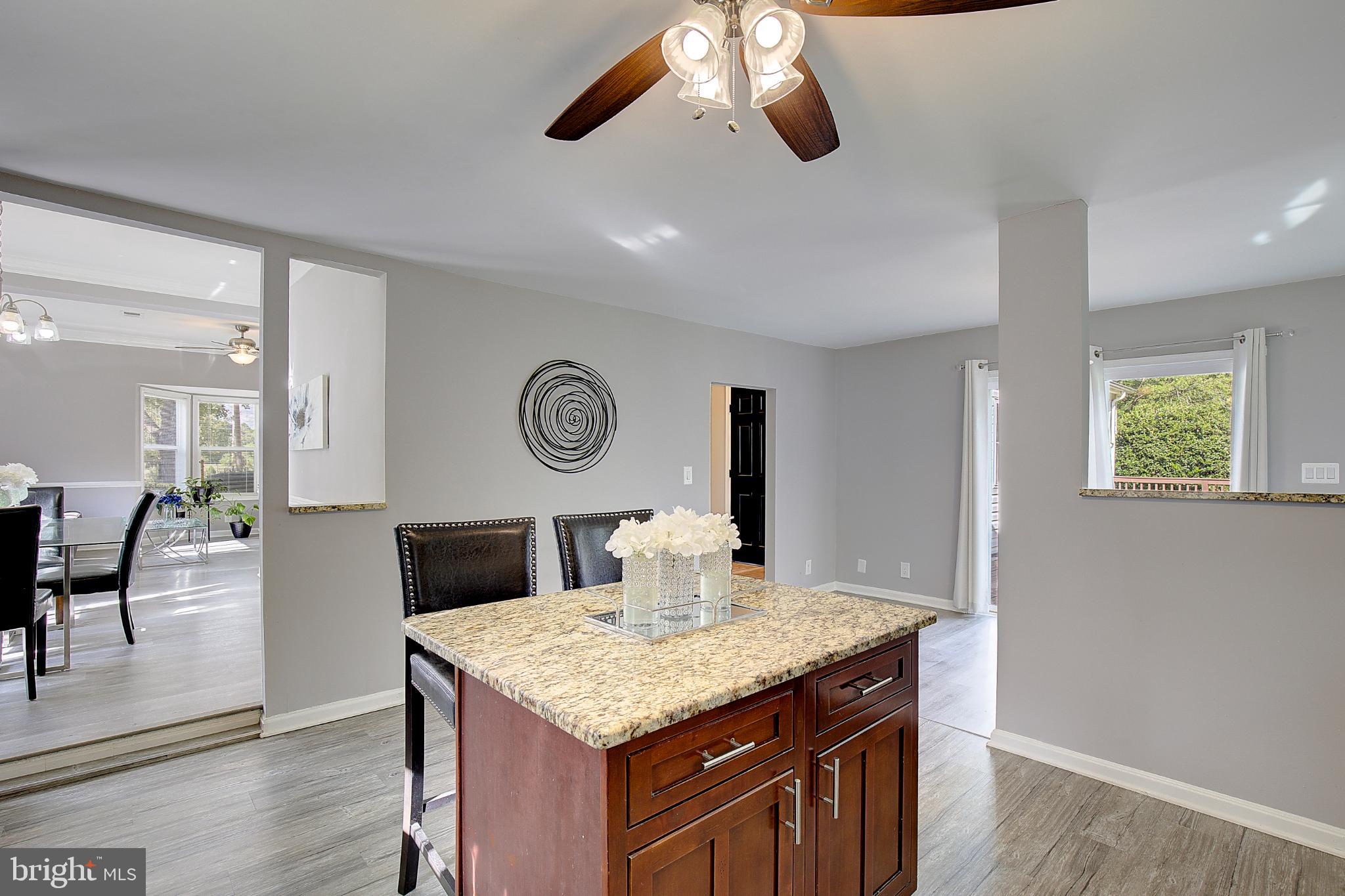 16811 Aquasco Road Brandywine, MD 20613 - Photo 12 of 34 Modern kitchen with stylish island charm.