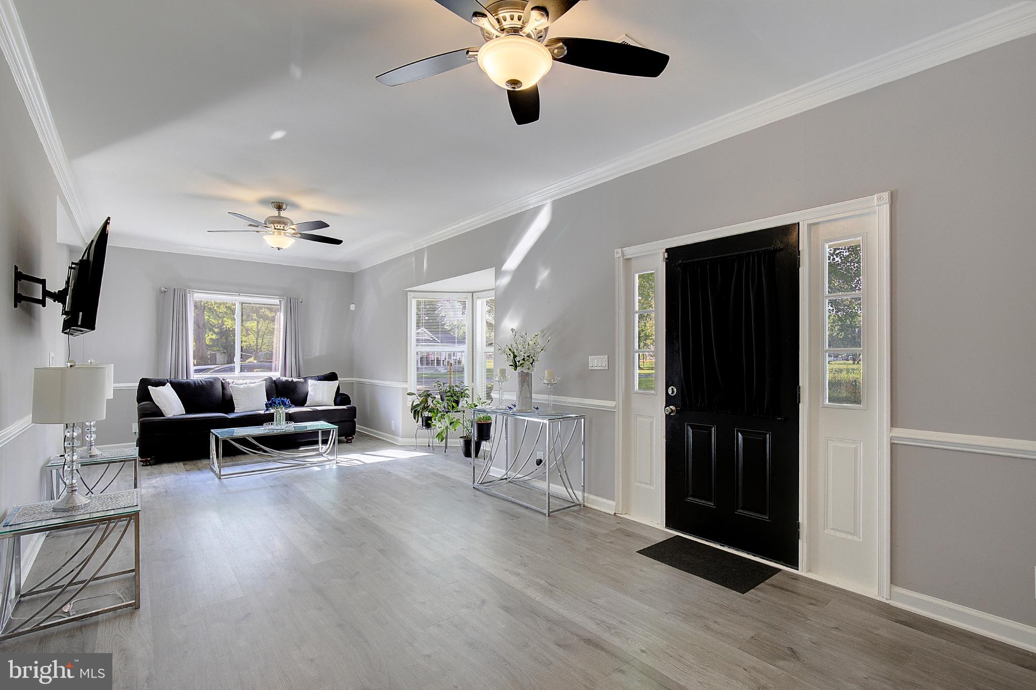 16811 Aquasco Road Brandywine, MD 20613 - Photo 3 of 34 Bright and airy living space with modern charm.