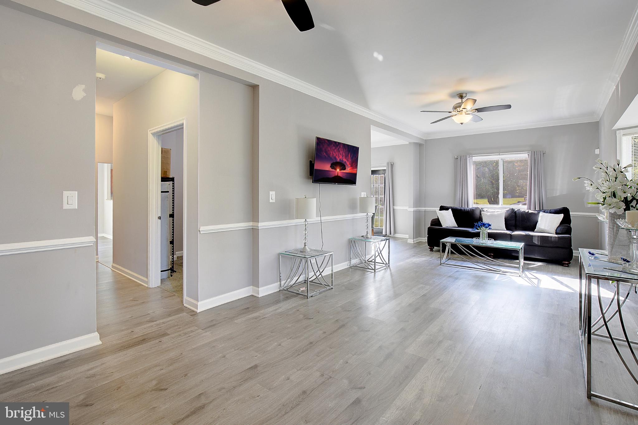 16811 Aquasco Road Brandywine, MD 20613 - Photo 9 of 34 Bright and airy living space with modern charm.