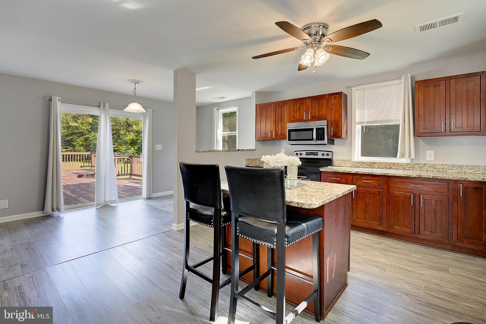 16811 Aquasco Road Brandywine, MD 20613 - Photo 10 of 34 Modern kitchen with natural light and style.