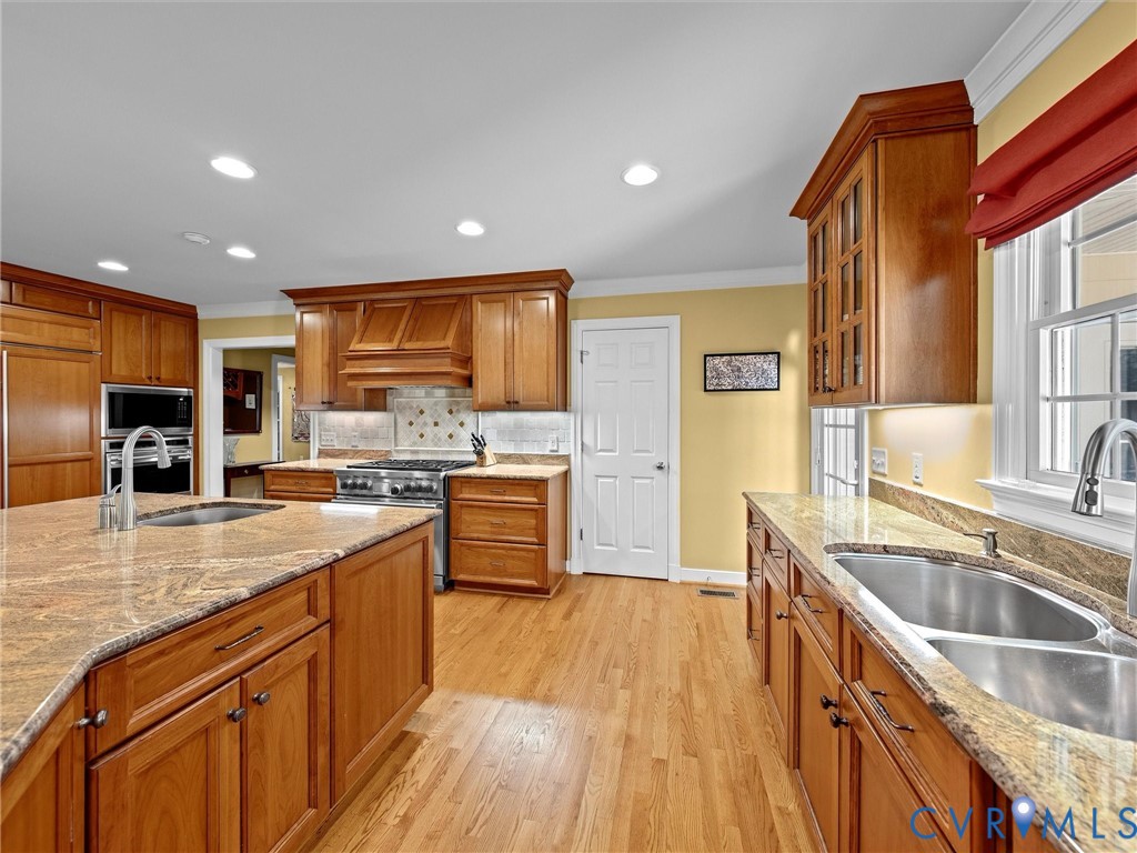 4428 Shirley Road Richmond, VA 23225 - Photo 28 of 70 Large pantry with shelving is to the right of the