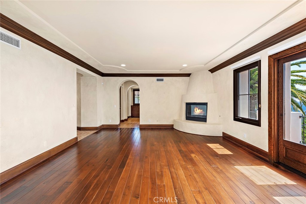 40 Timor Sea Newport Coast, CA 92657 - Photo 26 of 50 a view of an empty room with wooden floor and a window