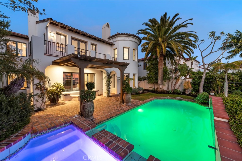 40 Timor Sea Newport Coast, CA 92657 - Photo 46 of 50 a front view of a house with swimming pool garden and patio