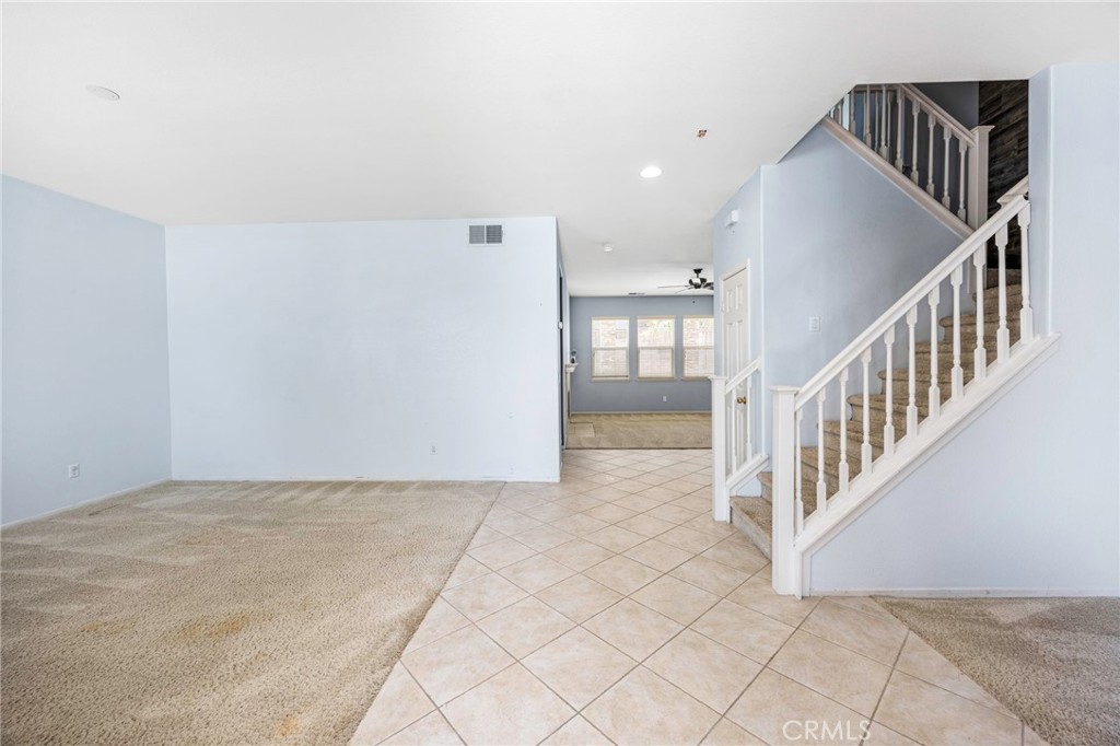 151 Ropango Way Hemet, CA 92545 - Photo 5 of 28 a view of staircase with white walls