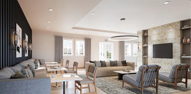 a kitchen with a refrigerator a stove top oven a counter space and wooden floor