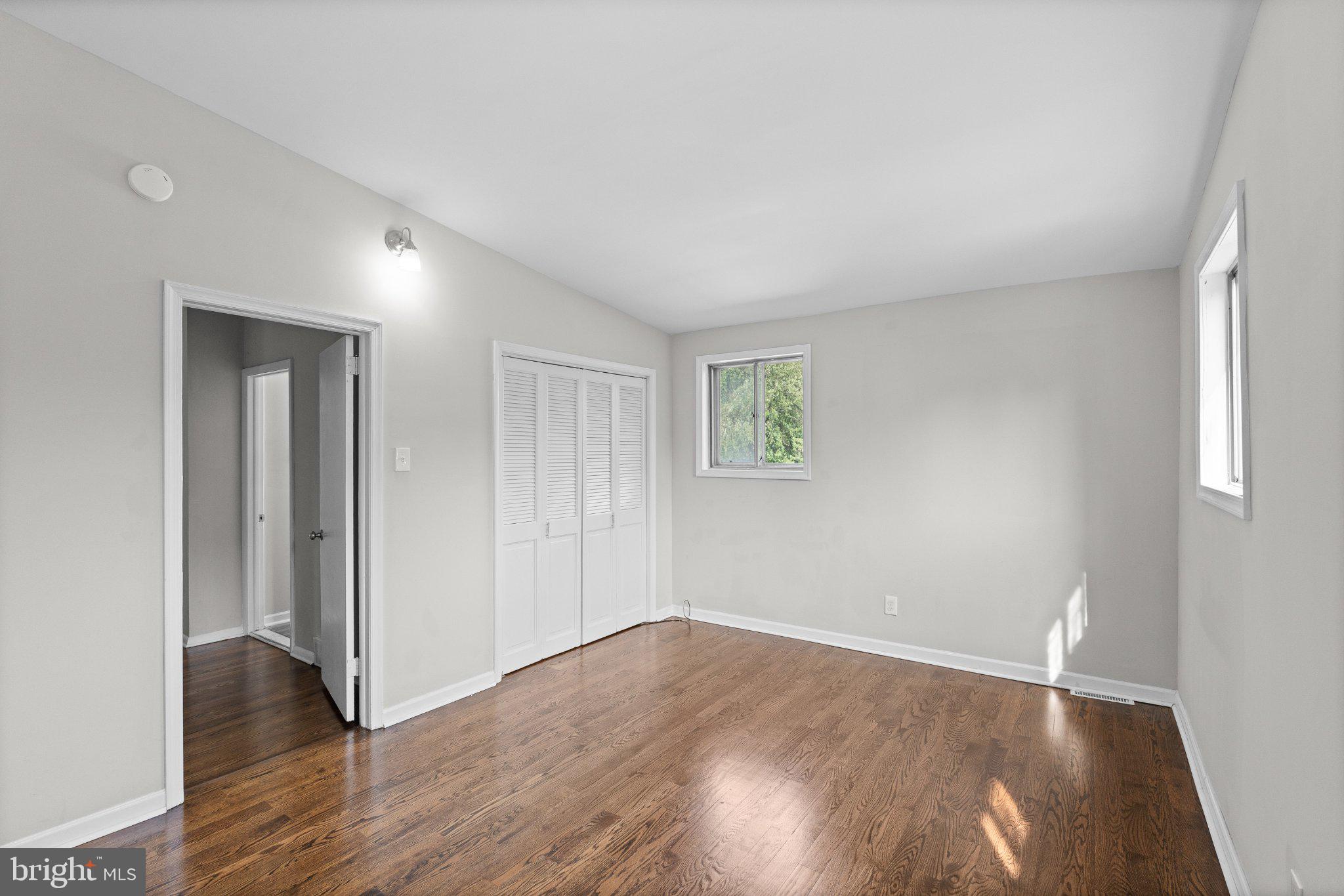 205 Juniper Road, Unit 288 Havertown, PA 19083 - Photo 9 of 28 Bright and airy room with hardwood floors.