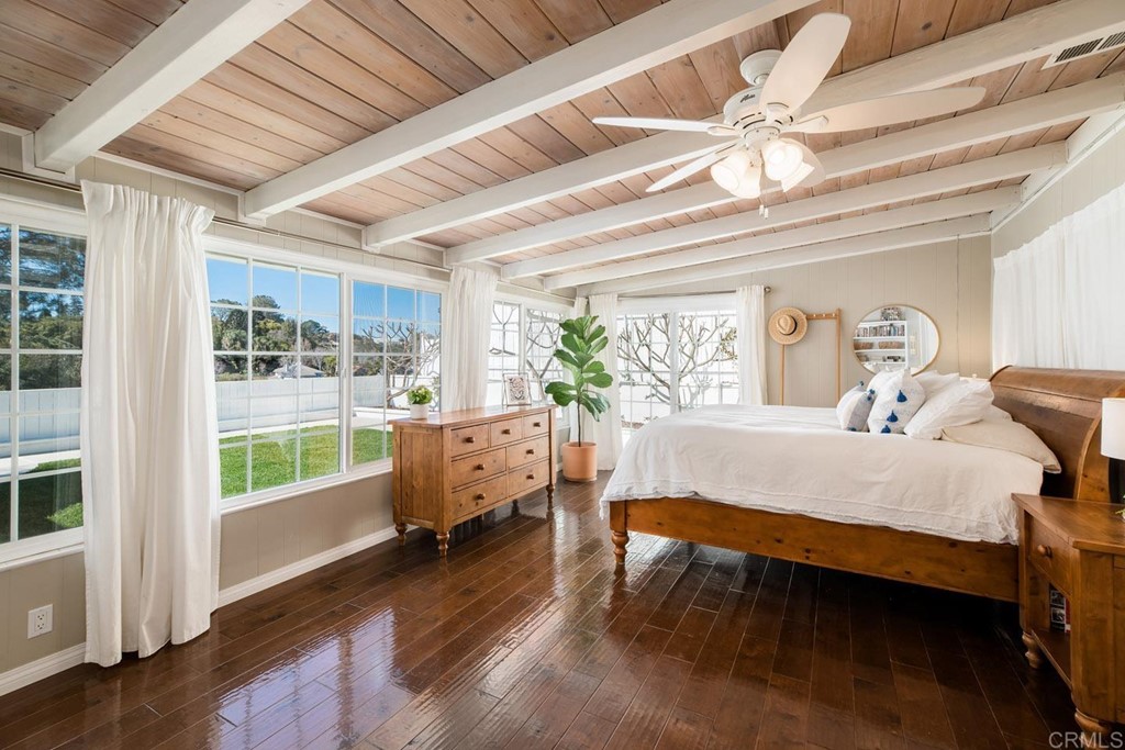 220 Coneflower Street Encinitas, CA 92024 - Photo 13 of 25 a bed room with furniture and a window
