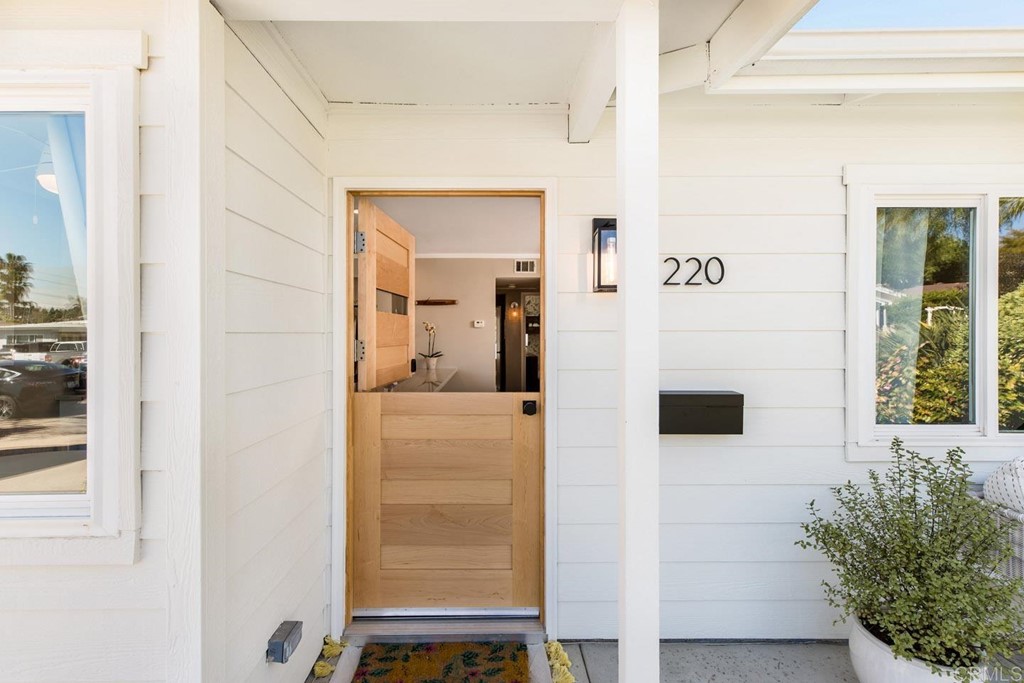 220 Coneflower Street Encinitas, CA 92024 - Photo 2 of 25 a view of front door with wooden floor