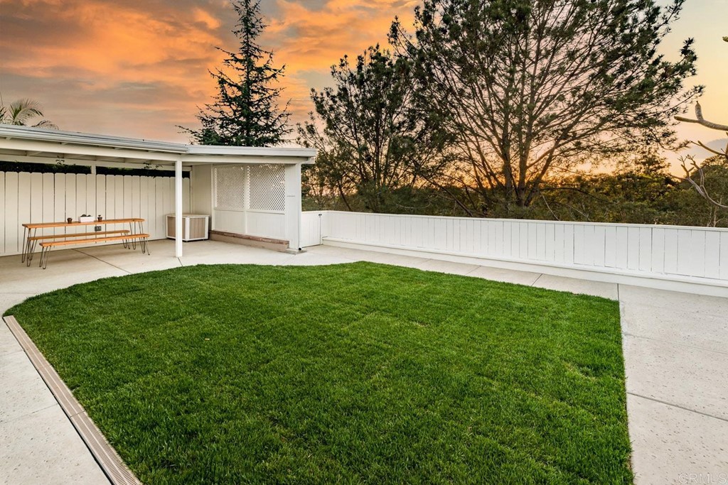 220 Coneflower Street Encinitas, CA 92024 - Photo 24 of 25 a view of a backyard with a garden and plants