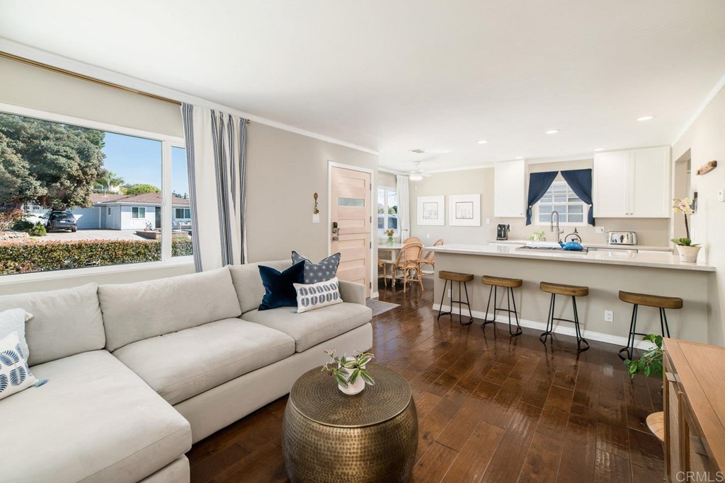 220 Coneflower Street Encinitas, CA 92024 - Photo 6 of 25 a living room with furniture and a large window