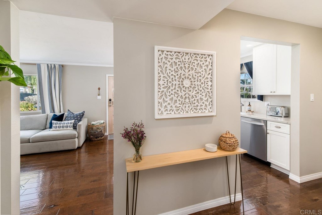 220 Coneflower Street Encinitas, CA 92024 - Photo 8 of 25 a living room with furniture and painting on the wall