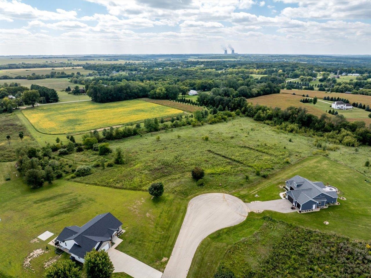 Longworth Close Stillman Valley, IL 61084 - Photo 9 of 16 an aerial view of a house with a yard