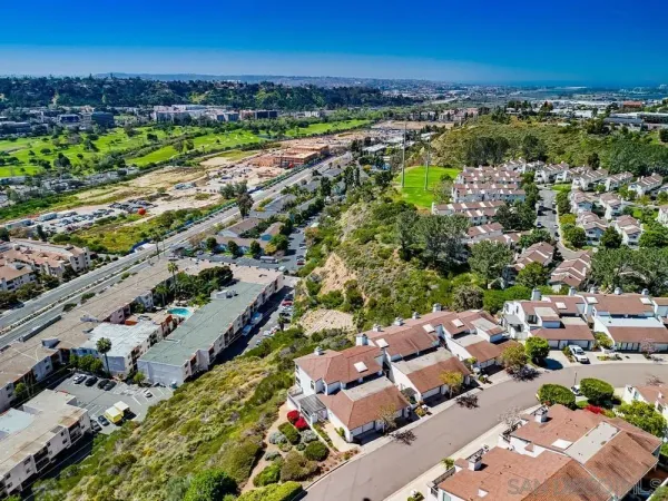 an aerial view of a city with lots of residential buildings