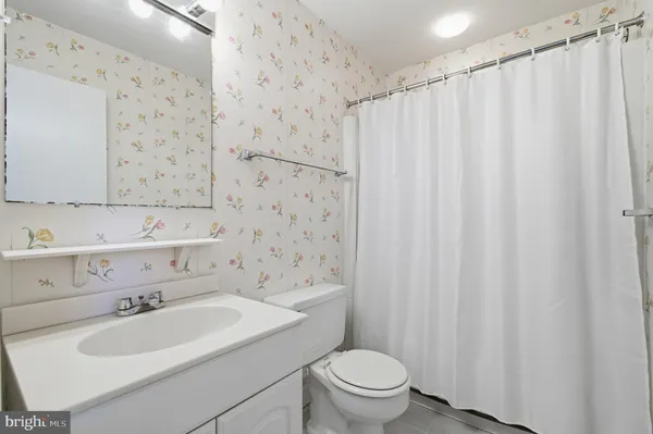 a room with furniture and a window