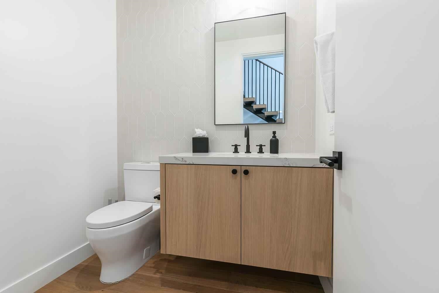 342 Palisades Circle, Unit SHARE 2 Olympic Valley, CA 96146 - Photo 13 of 28 a bathroom with a toilet a sink and mirror