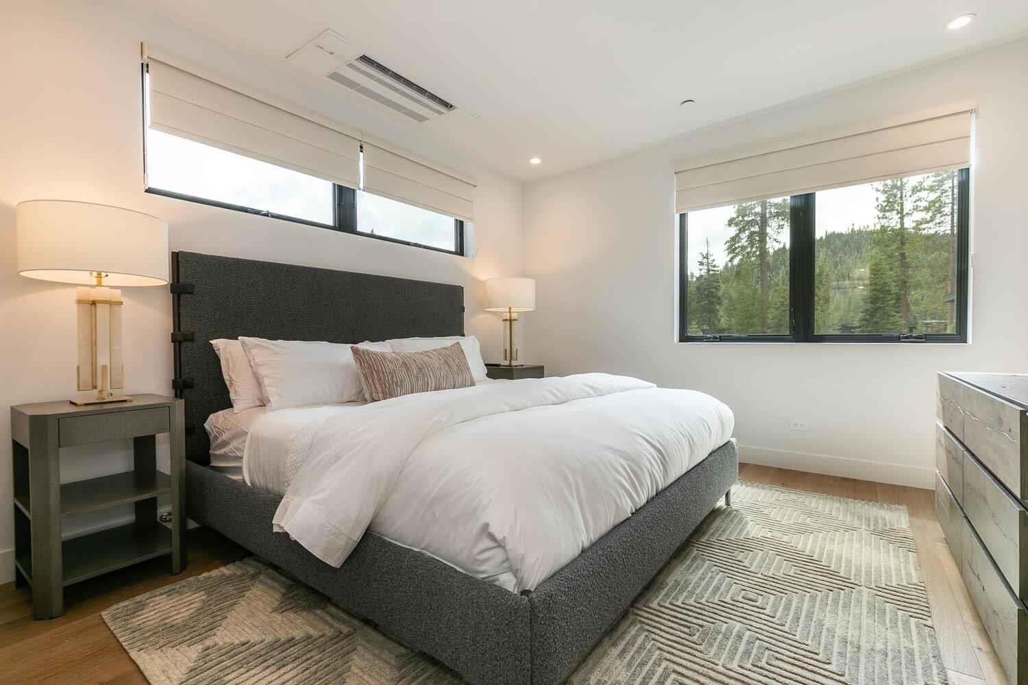 342 Palisades Circle, Unit SHARE 2 Olympic Valley, CA 96146 - Photo 24 of 28 a large bed sitting in a bedroom next to a window