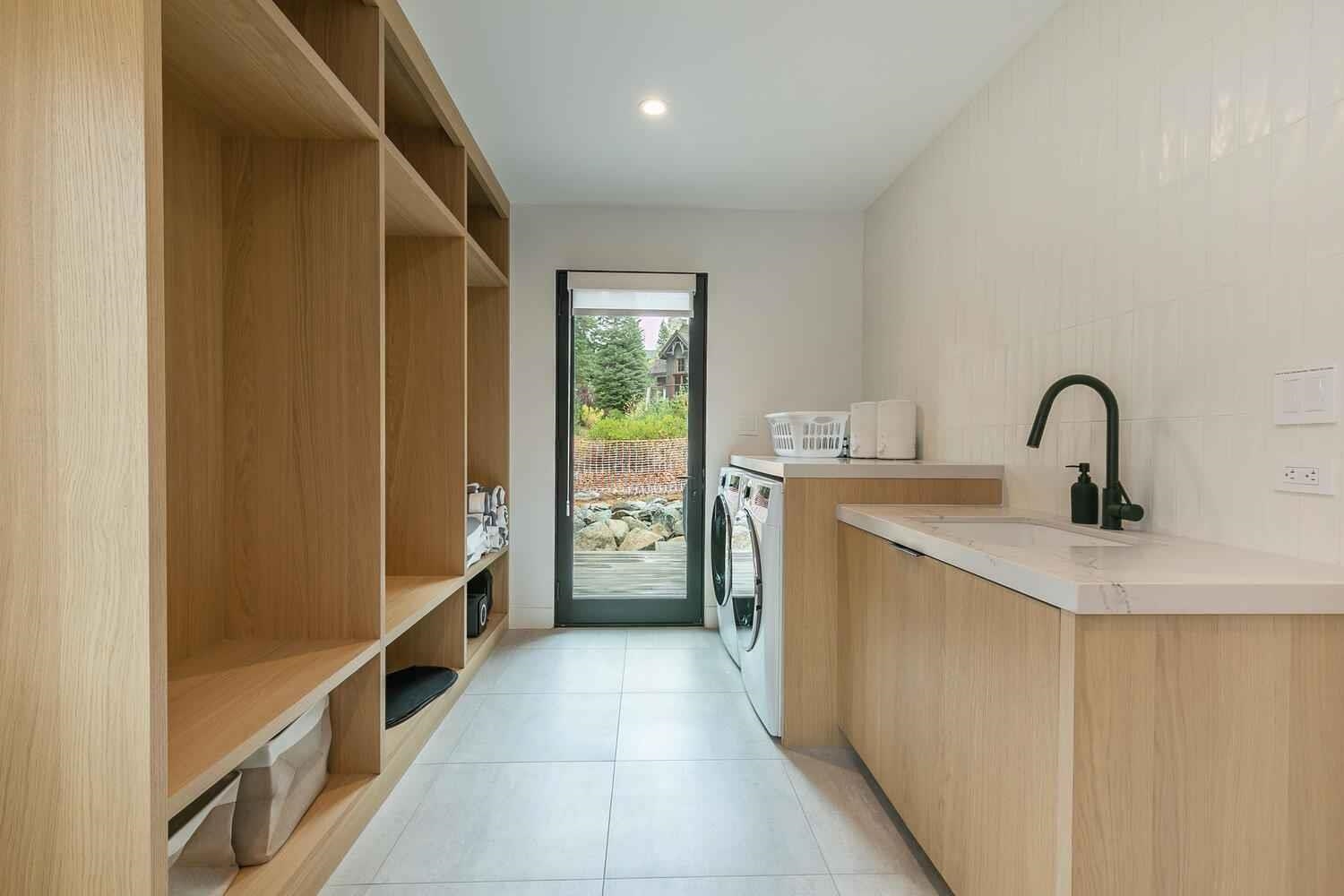 342 Palisades Circle, Unit SHARE 2 Olympic Valley, CA 96146 - Photo 25 of 28 a kitchen with a refrigerator and a sink