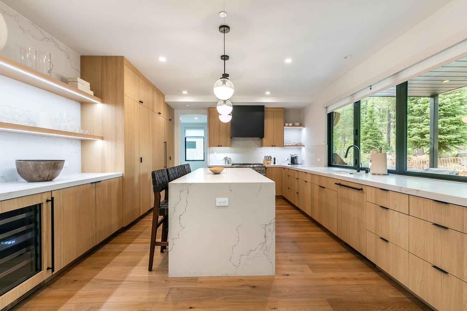 342 Palisades Circle, Unit SHARE 2 Olympic Valley, CA 96146 - Photo 3 of 28 a kitchen with a sink window and cabinets