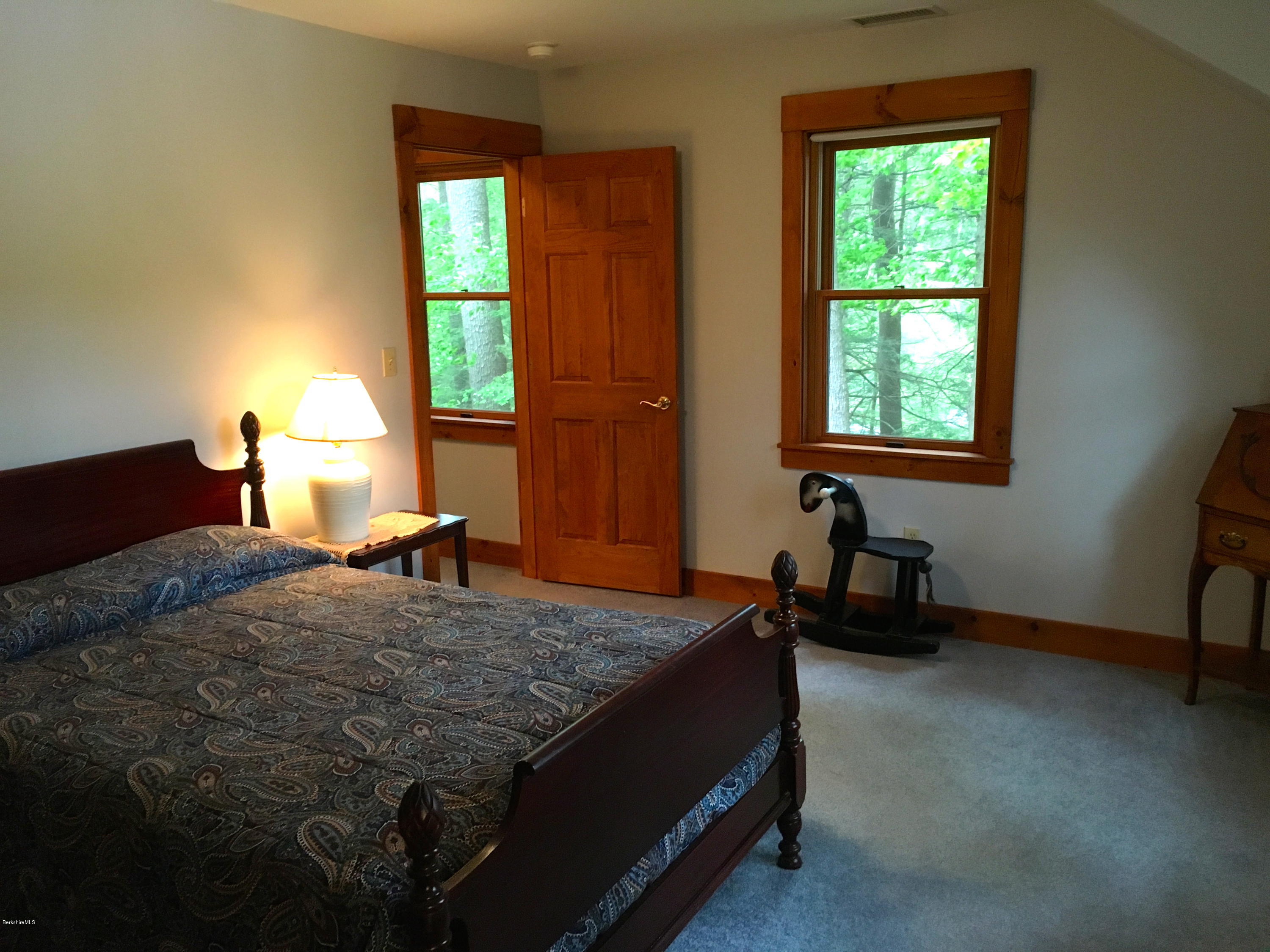 26 Bidwell Road Monterey, MA 01245 - Photo 11 of 17 a bedroom with a bed and a window