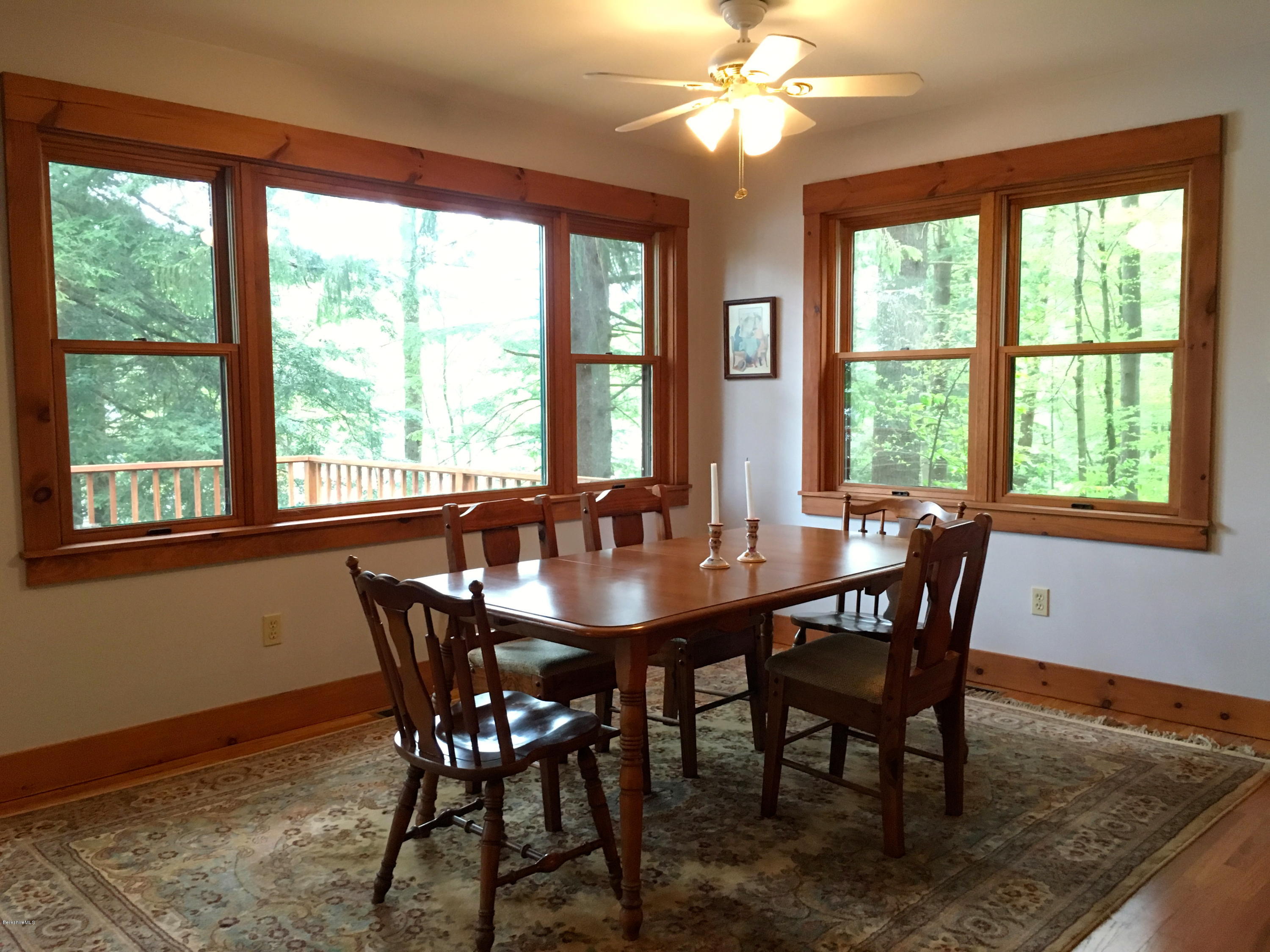 26 Bidwell Road Monterey, MA 01245 - Photo 4 of 17 a view of a dining room with furniture window and outside view