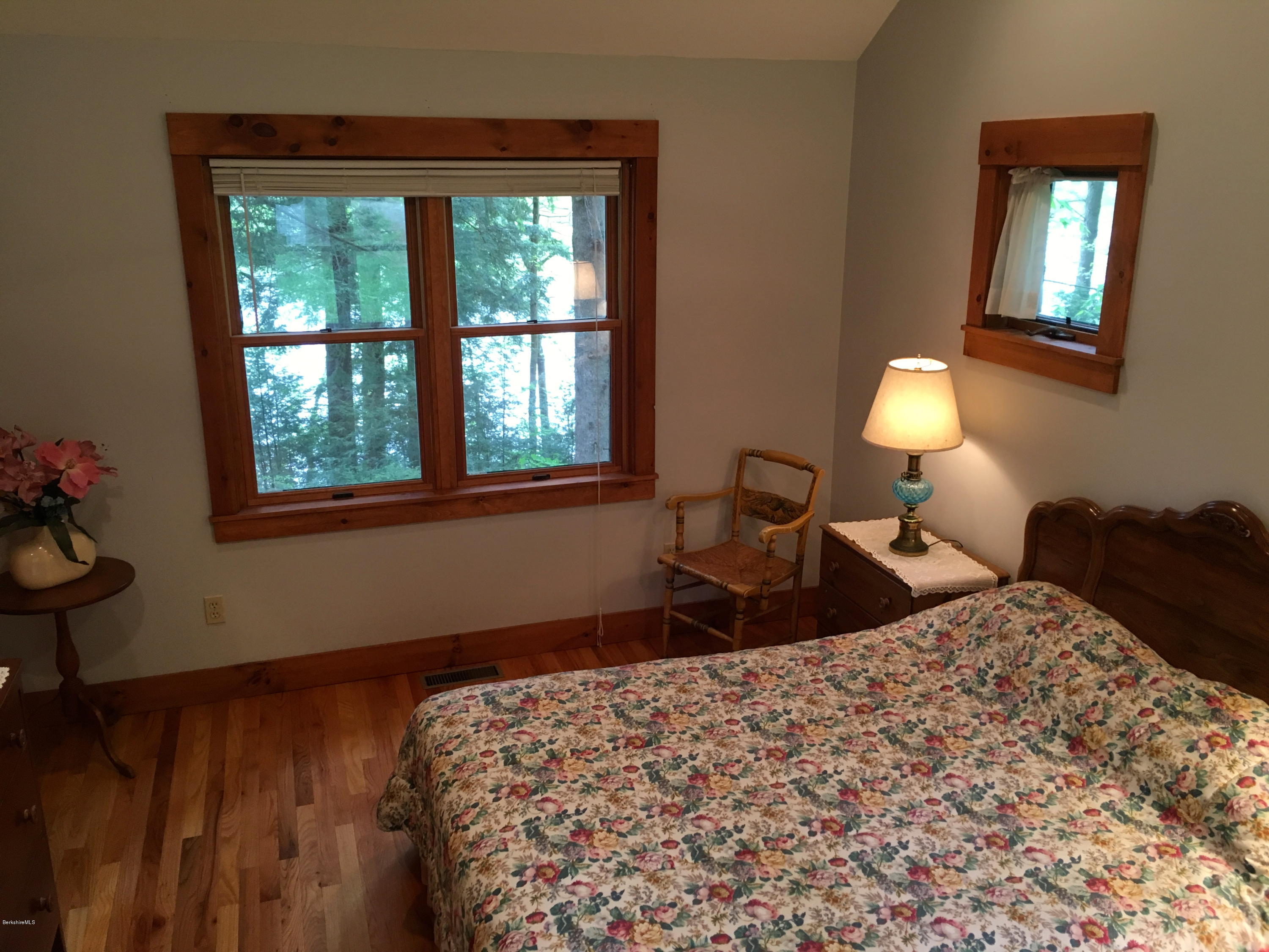 26 Bidwell Road Monterey, MA 01245 - Photo 8 of 17 a bedroom with a bed and window