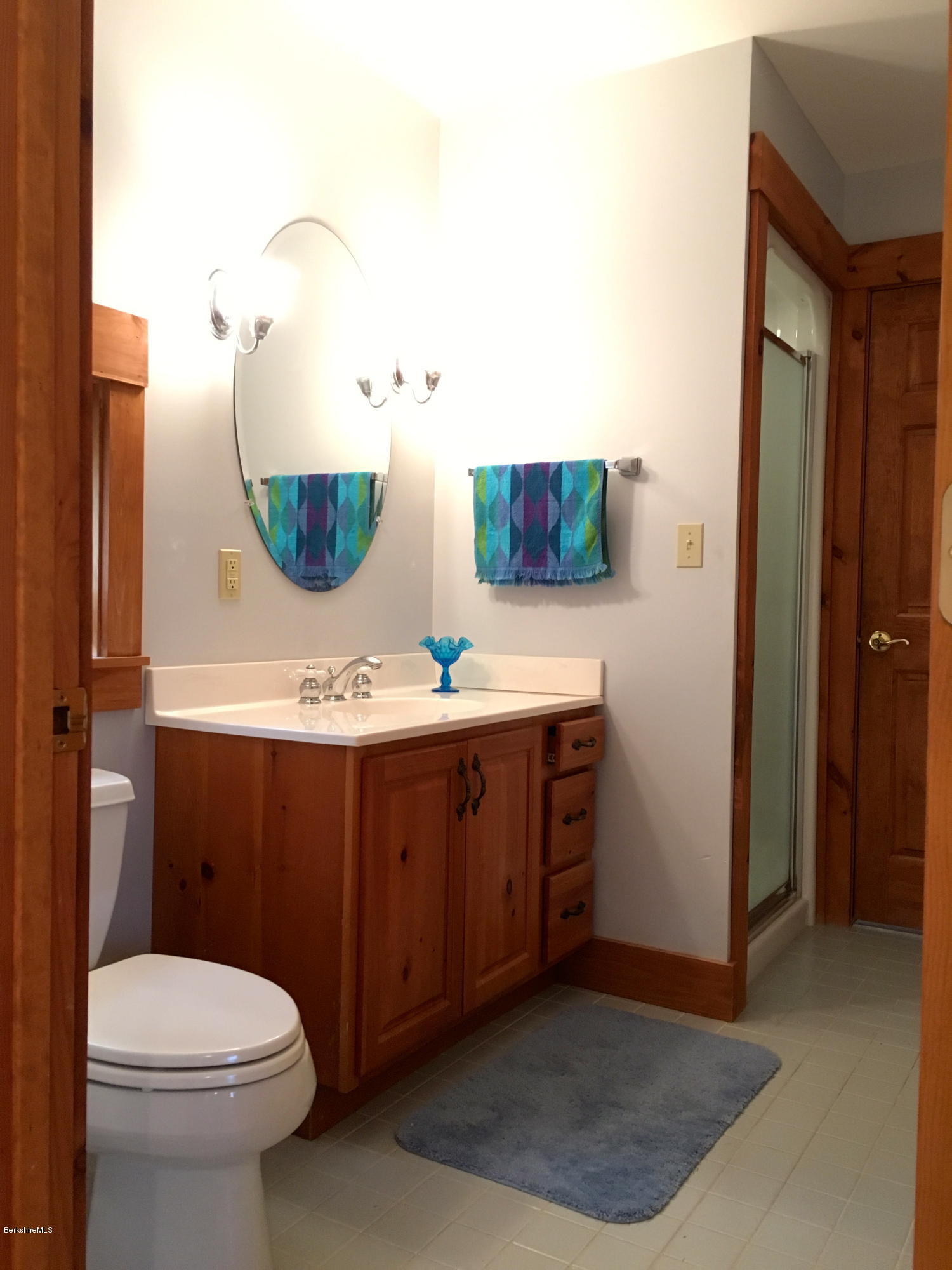 26 Bidwell Road Monterey, MA 01245 - Photo 9 of 17 a bathroom with a sink vanity mirror and toilet