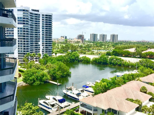 a view of a lake with a city