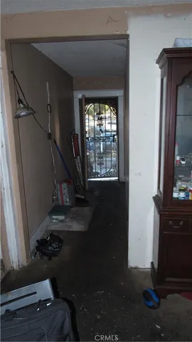 a kitchen with stainless steel appliances wooden cabinets and a stove top oven