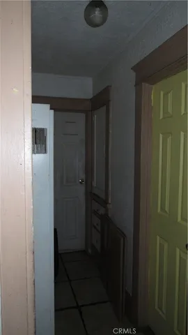 a view of a house with backyard and garden