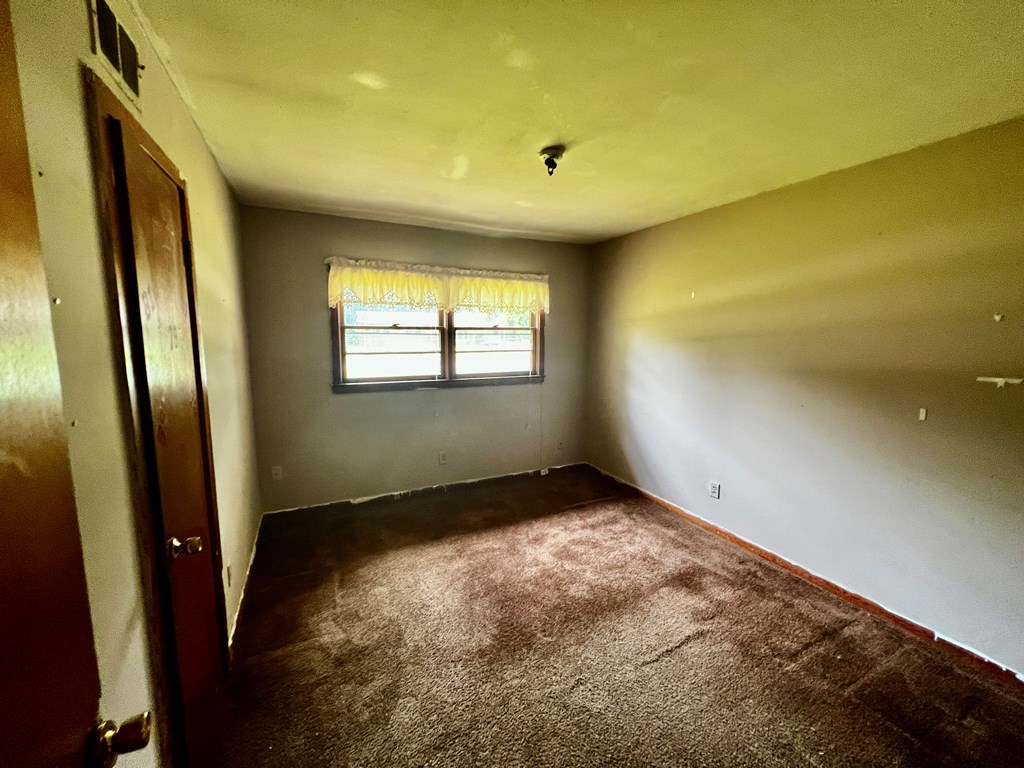 850 Brighton Road Columbus, GA 31906 - Photo 12 of 13 a view of empty room with window