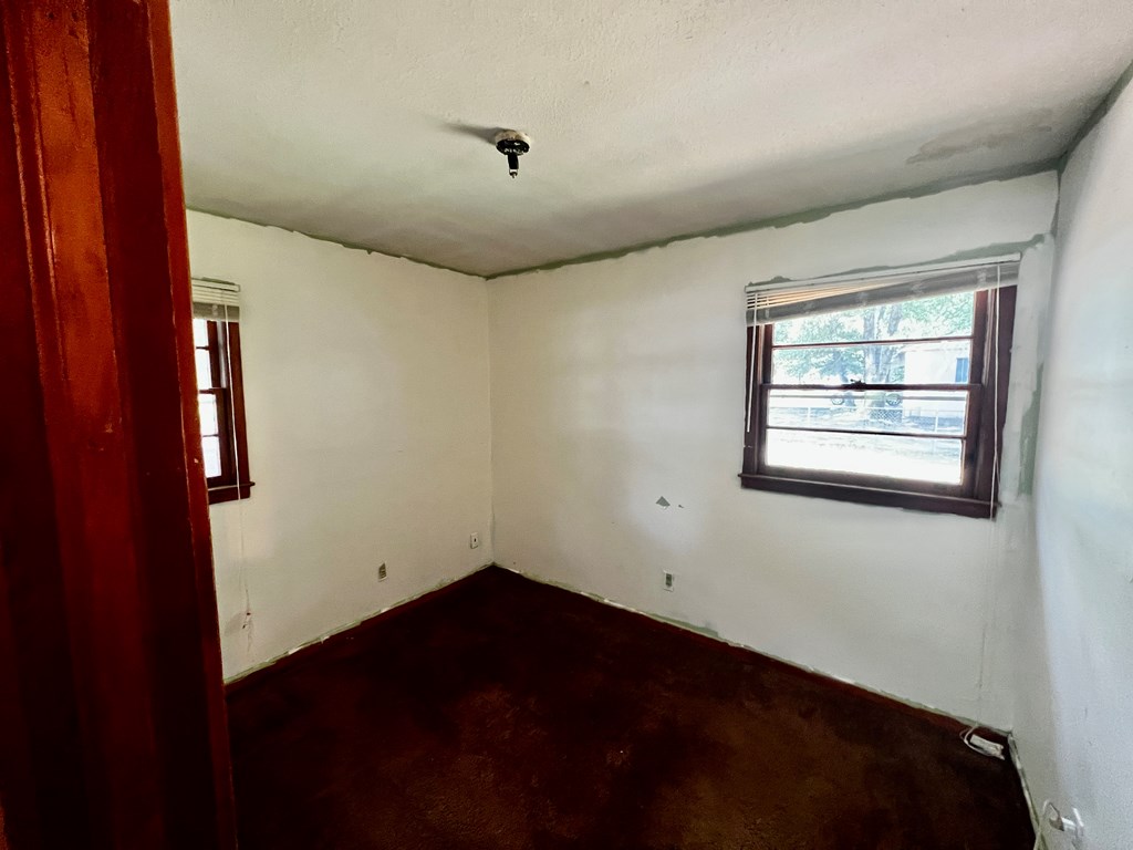 850 Brighton Road Columbus, GA 31906 - Photo 5 of 13 an empty room with windows