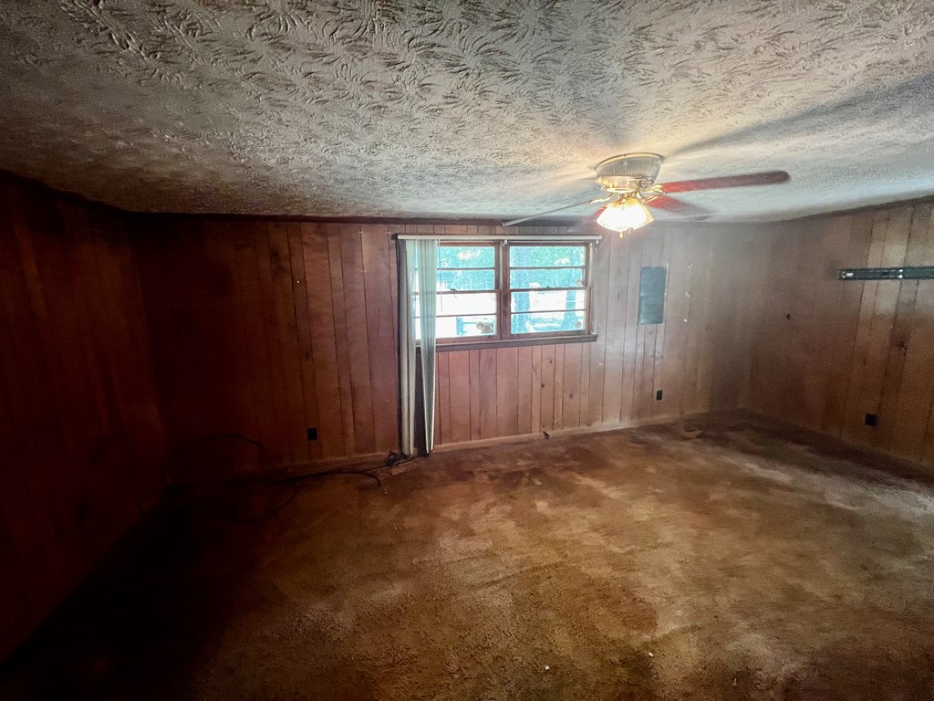 850 Brighton Road Columbus, GA 31906 - Photo 10 of 13 wooden floor in an empty room with a window