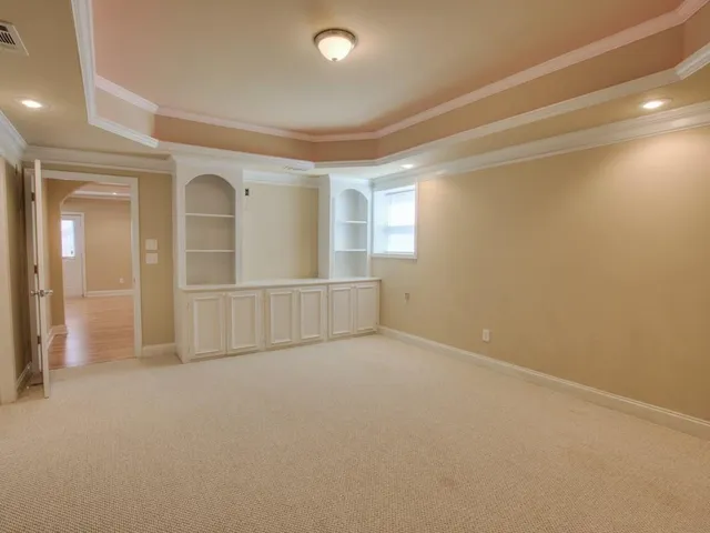 en empty room with windows