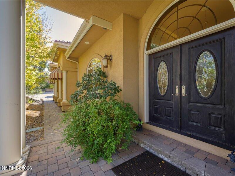 1120 Zolezzi Lane Reno, NV 89511 - Photo 11 of 48 a front view of a house with garden