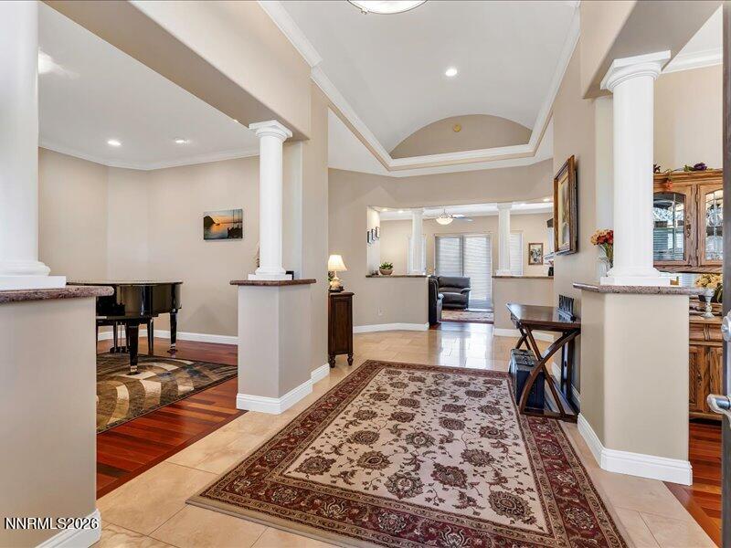 1120 Zolezzi Lane Reno, NV 89511 - Photo 15 of 48 a living room with stainless steel appliances furniture rug and wooden floor