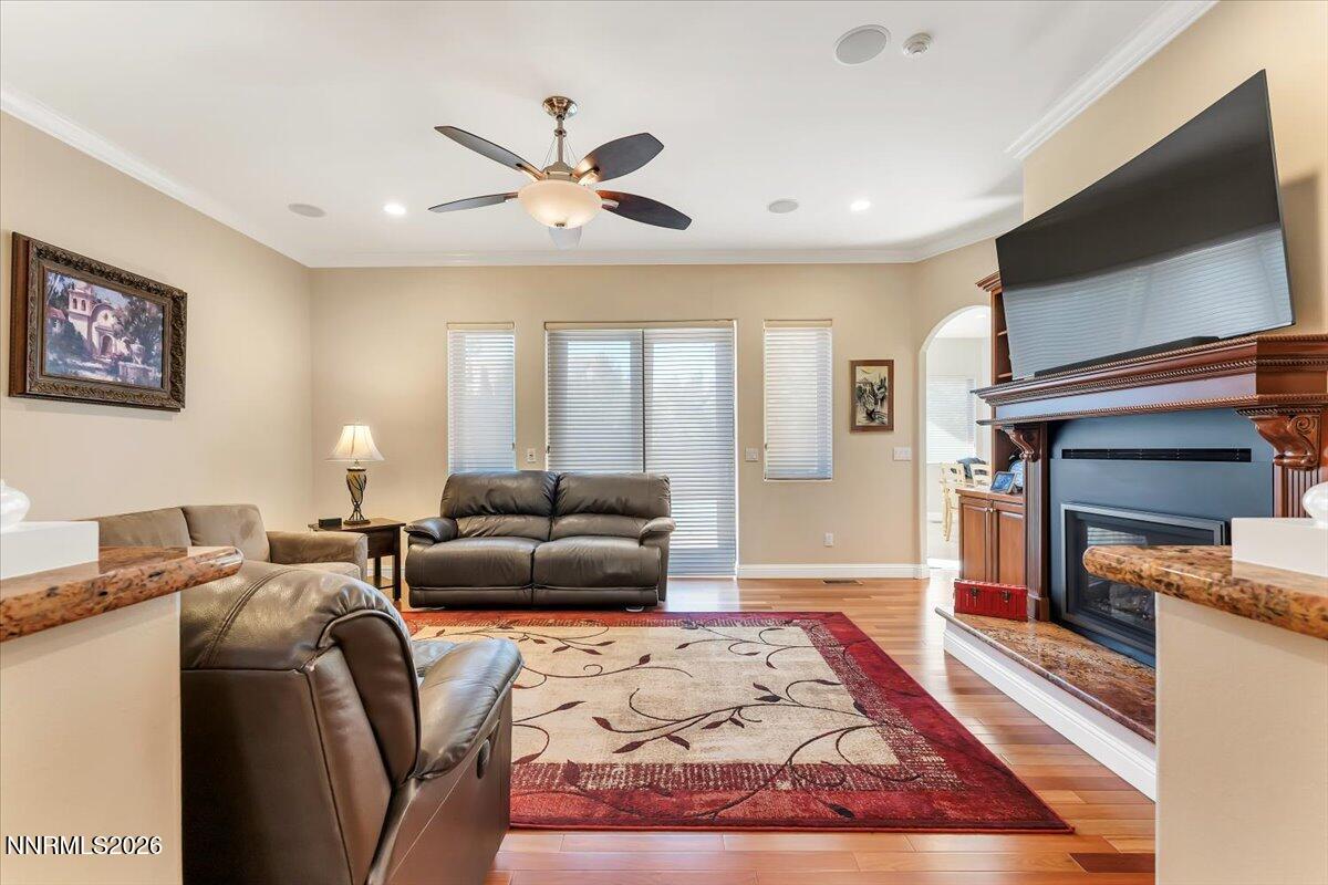 1120 Zolezzi Lane Reno, NV 89511 - Photo 17 of 48 a living room with furniture and a flat screen tv