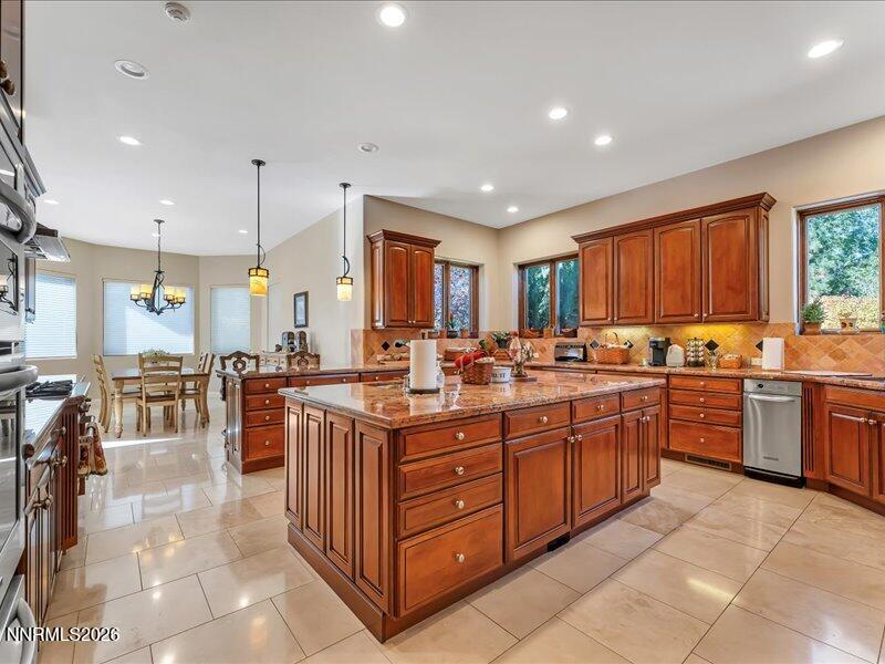 1120 Zolezzi Lane Reno, NV 89511 - Photo 21 of 48 a kitchen with lots of counter top space