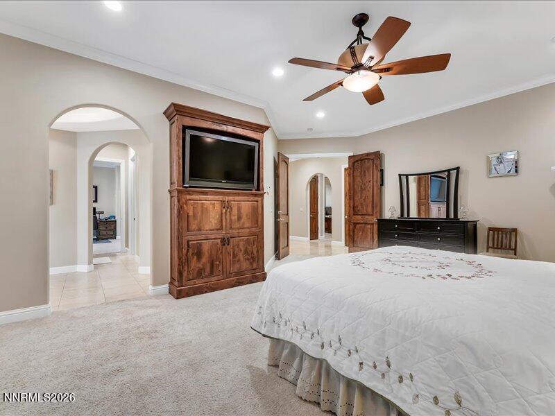 1120 Zolezzi Lane Reno, NV 89511 - Photo 26 of 48 a living room with a bed and a television