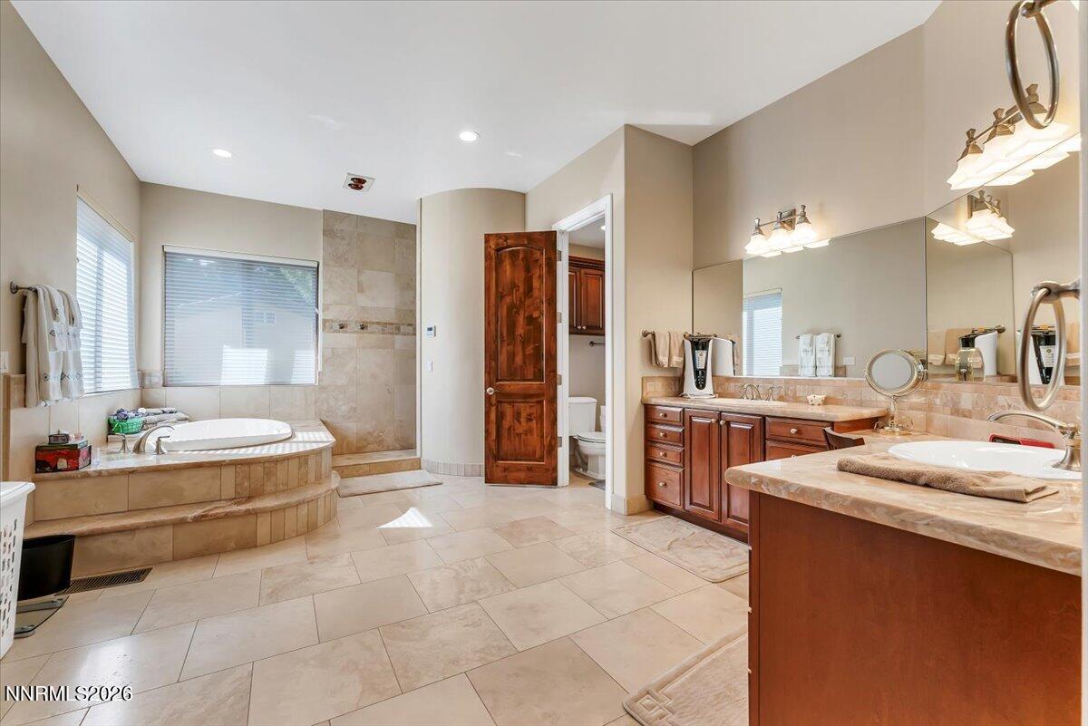 1120 Zolezzi Lane Reno, NV 89511 - Photo 28 of 48 a large room with a large window and stainless steel appliances