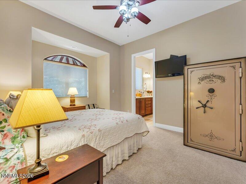 1120 Zolezzi Lane Reno, NV 89511 - Photo 30 of 48 a bedroom with a bed and a walk in closet