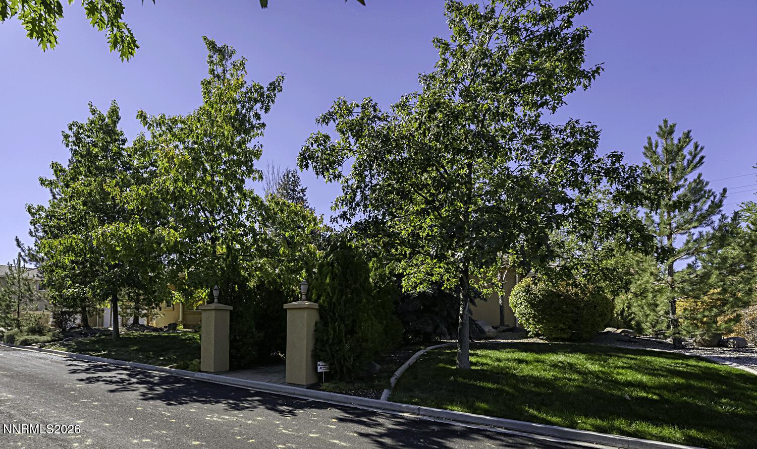 1120 Zolezzi Lane Reno, NV 89511 - Photo 3 of 48 front view of a house with a yard
