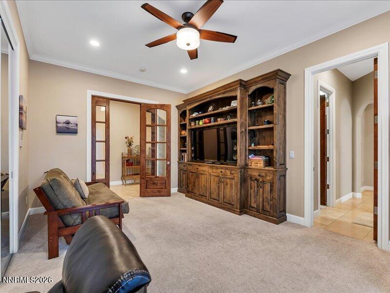 1120 Zolezzi Lane Reno, NV 89511 - Photo 35 of 48 a view of a livingroom with furniture and a ceiling fan