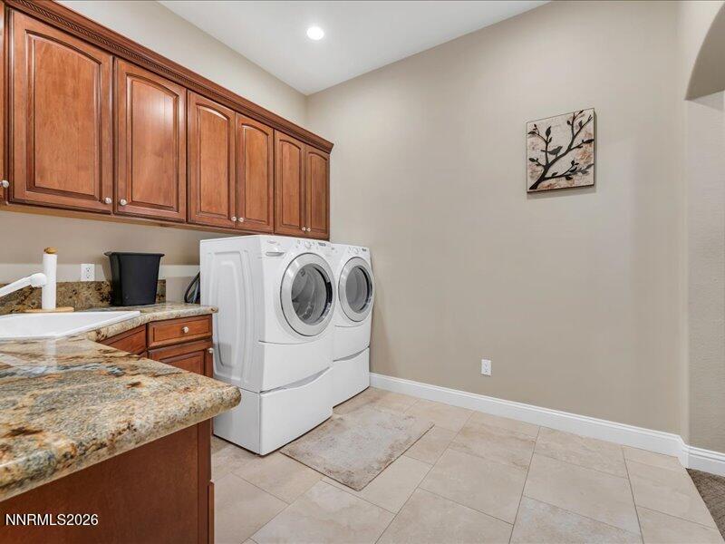 1120 Zolezzi Lane Reno, NV 89511 - Photo 37 of 48 a utility room with dryer and washer