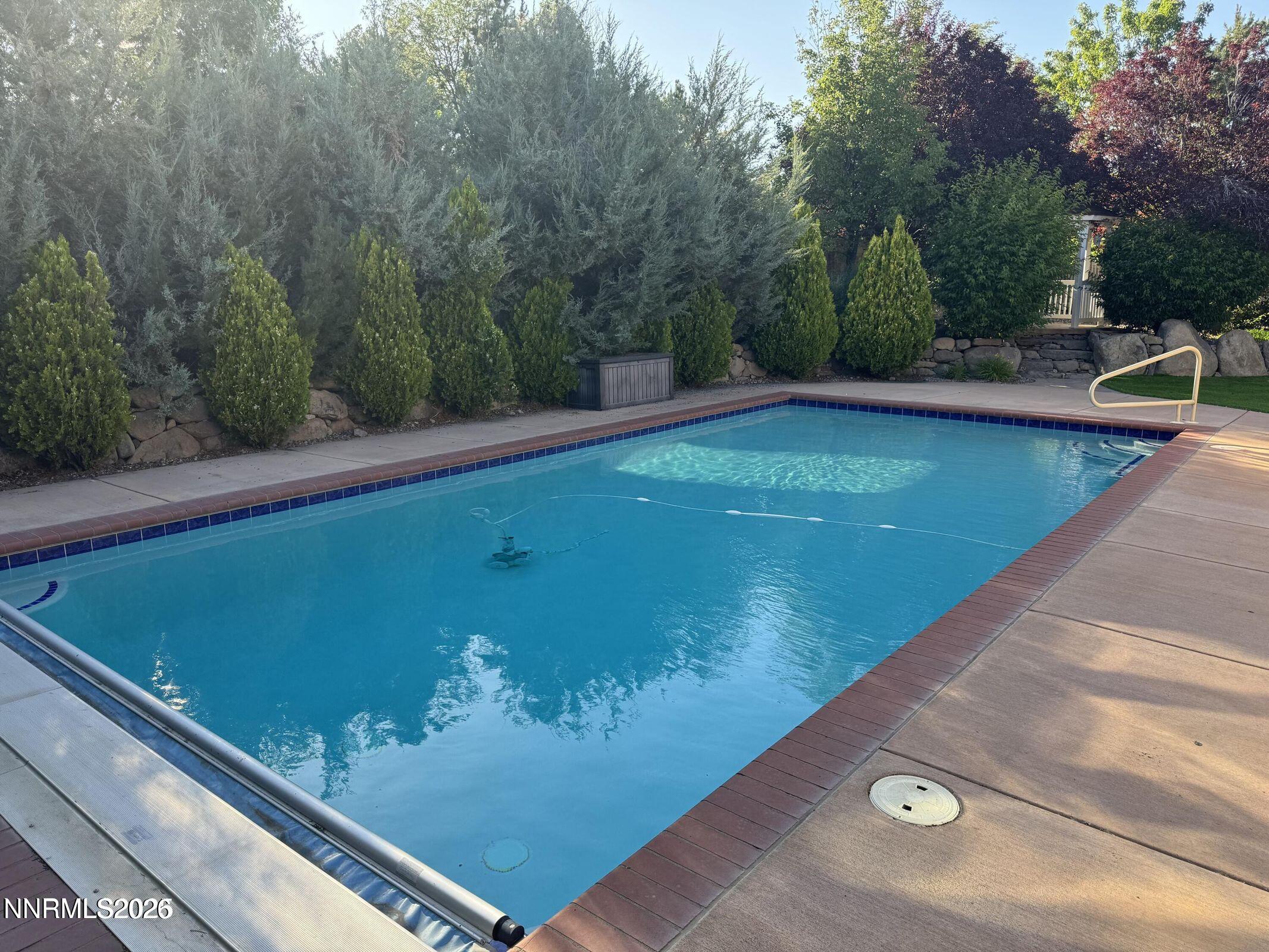 1120 Zolezzi Lane Reno, NV 89511 - Photo 40 of 48 a view of a pool with a yard