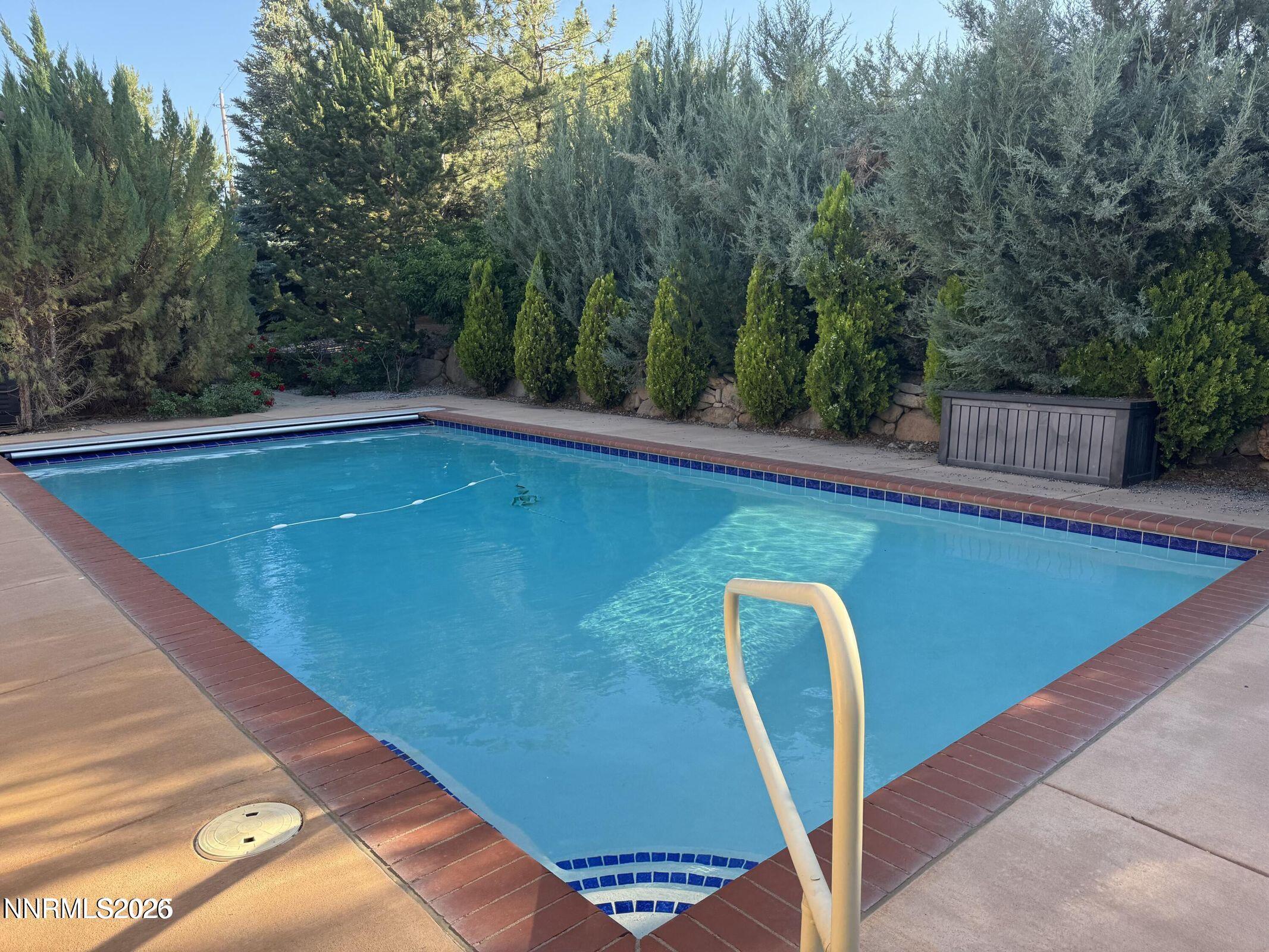 1120 Zolezzi Lane Reno, NV 89511 - Photo 41 of 48 a view of a backyard with swimming pool