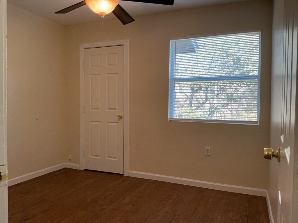 403 Hedgewood Drive, Unit D Georgetown, TX 78628 - Photo 11 of 12 an empty room with a window