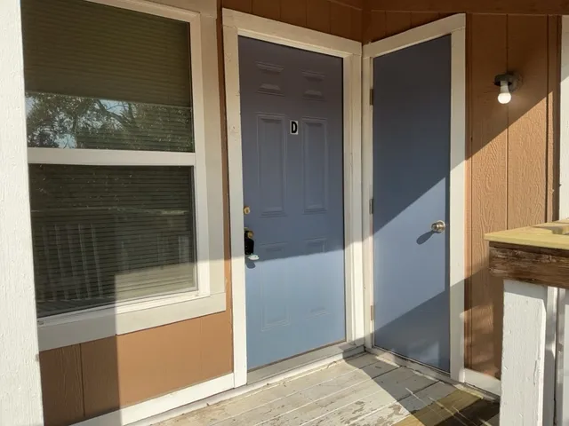 a bathroom with a tub and shower