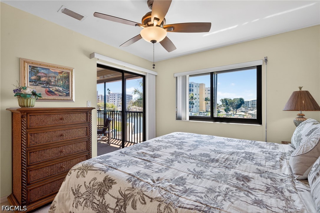 200 Lenell Road, Unit 222 Fort Myers Beach, FL 33931 - Photo 11 of 33 a bedroom with a bed and a window