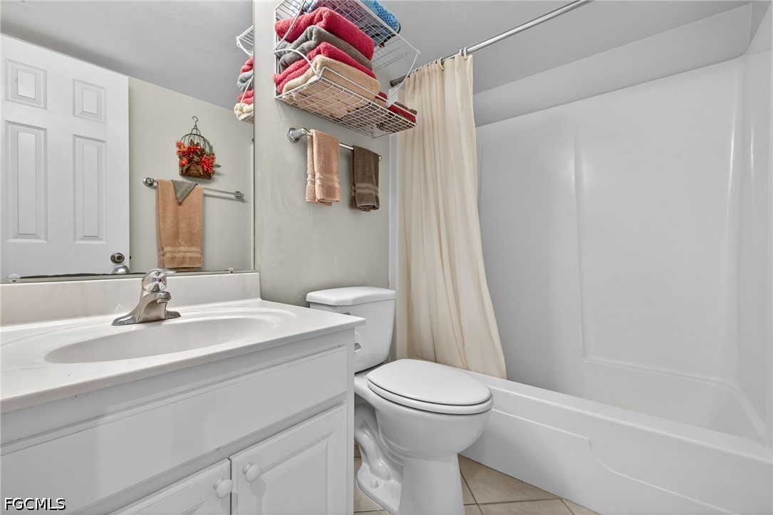 200 Lenell Road, Unit 222 Fort Myers Beach, FL 33931 - Photo 15 of 33 a bathroom with a sink vanity mirror and toilet