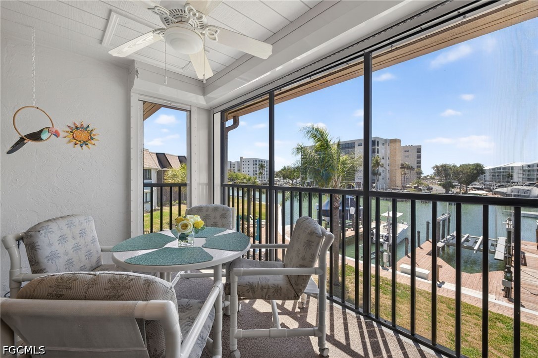 200 Lenell Road, Unit 222 Fort Myers Beach, FL 33931 - Photo 16 of 33 a living room with furniture and a large window